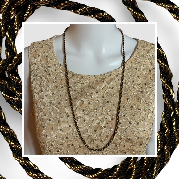 Trifari Jewelry - VTG Trifari Gold and Black Necklace with Sleek Design